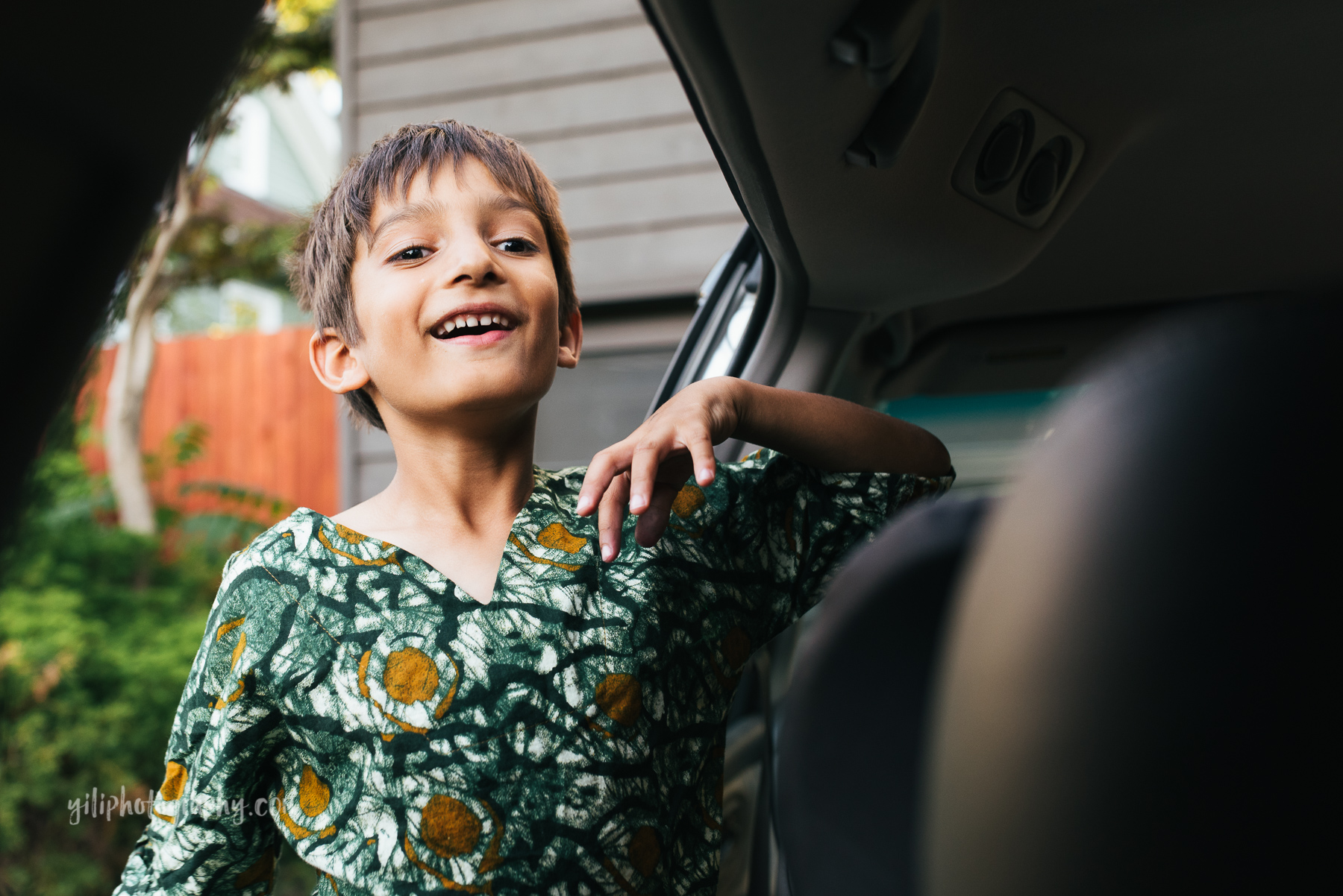 boy getting into car, seattle day in the life session