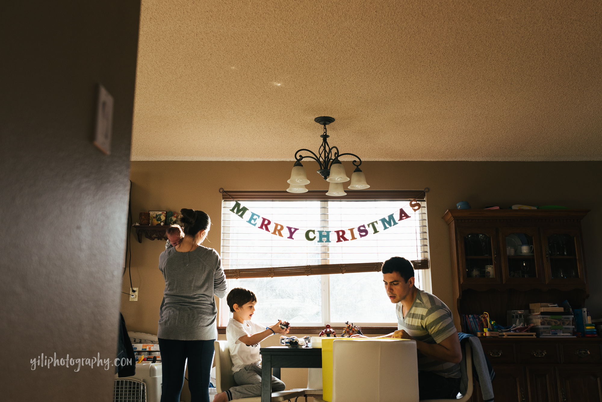 seattle family together in sunny living room