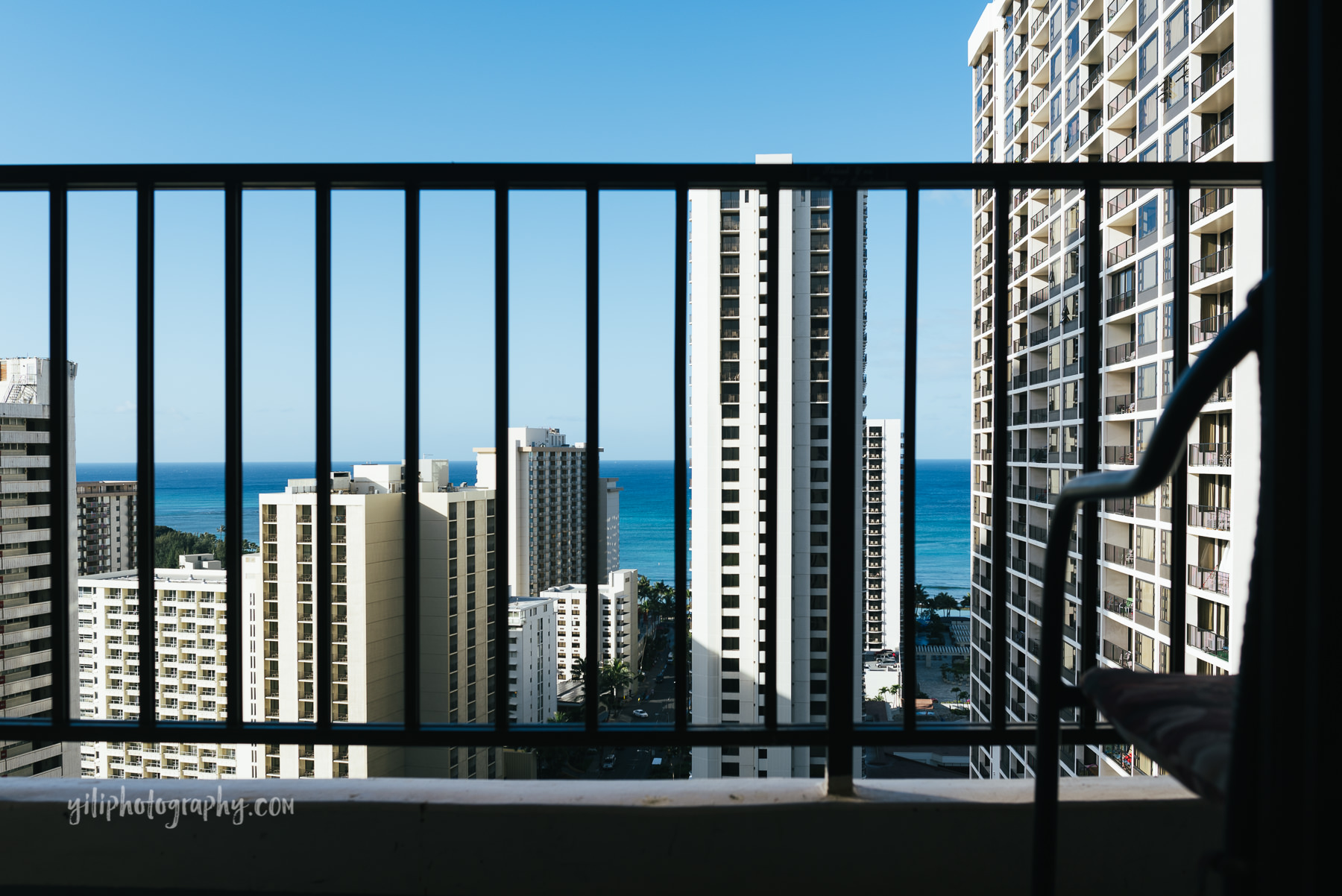 view of waikiki off condo balcony