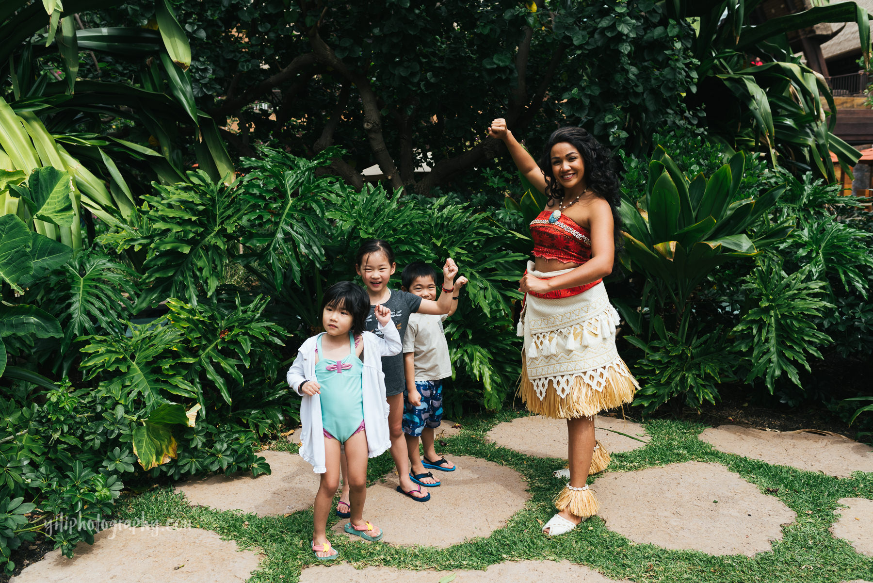 children posing with moana at aulani