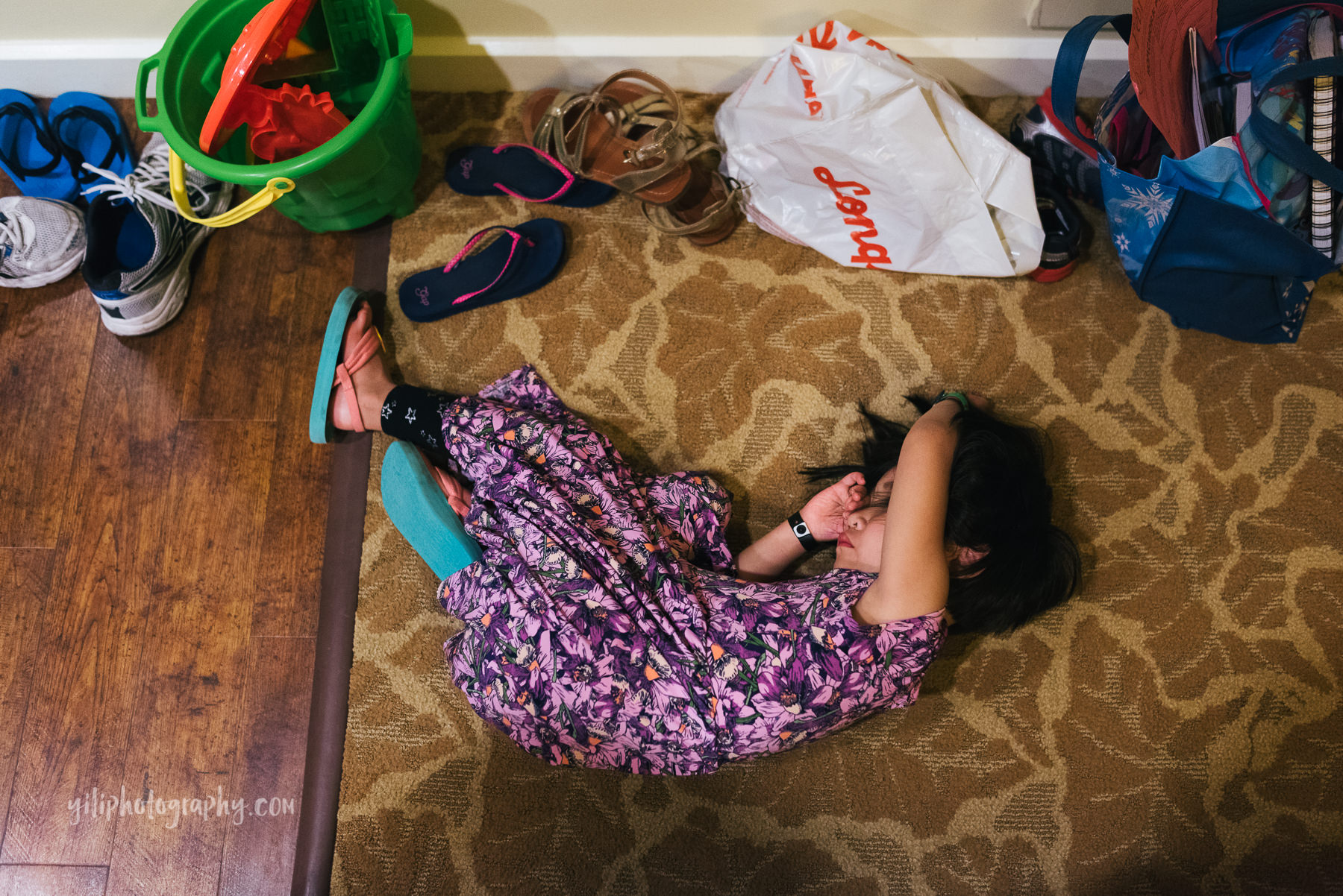 little girl passed out on hotel floor