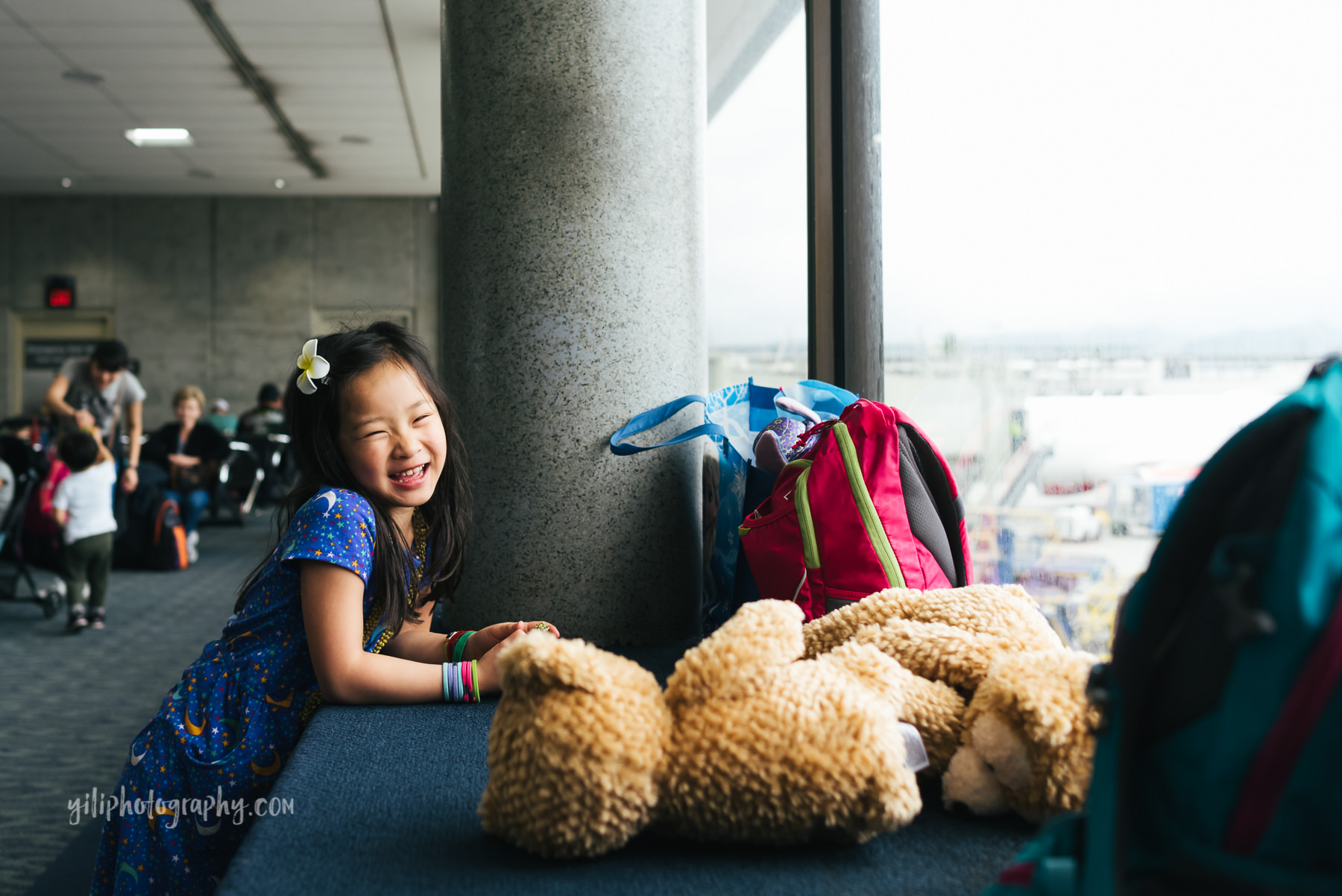 girl smiling at airport
