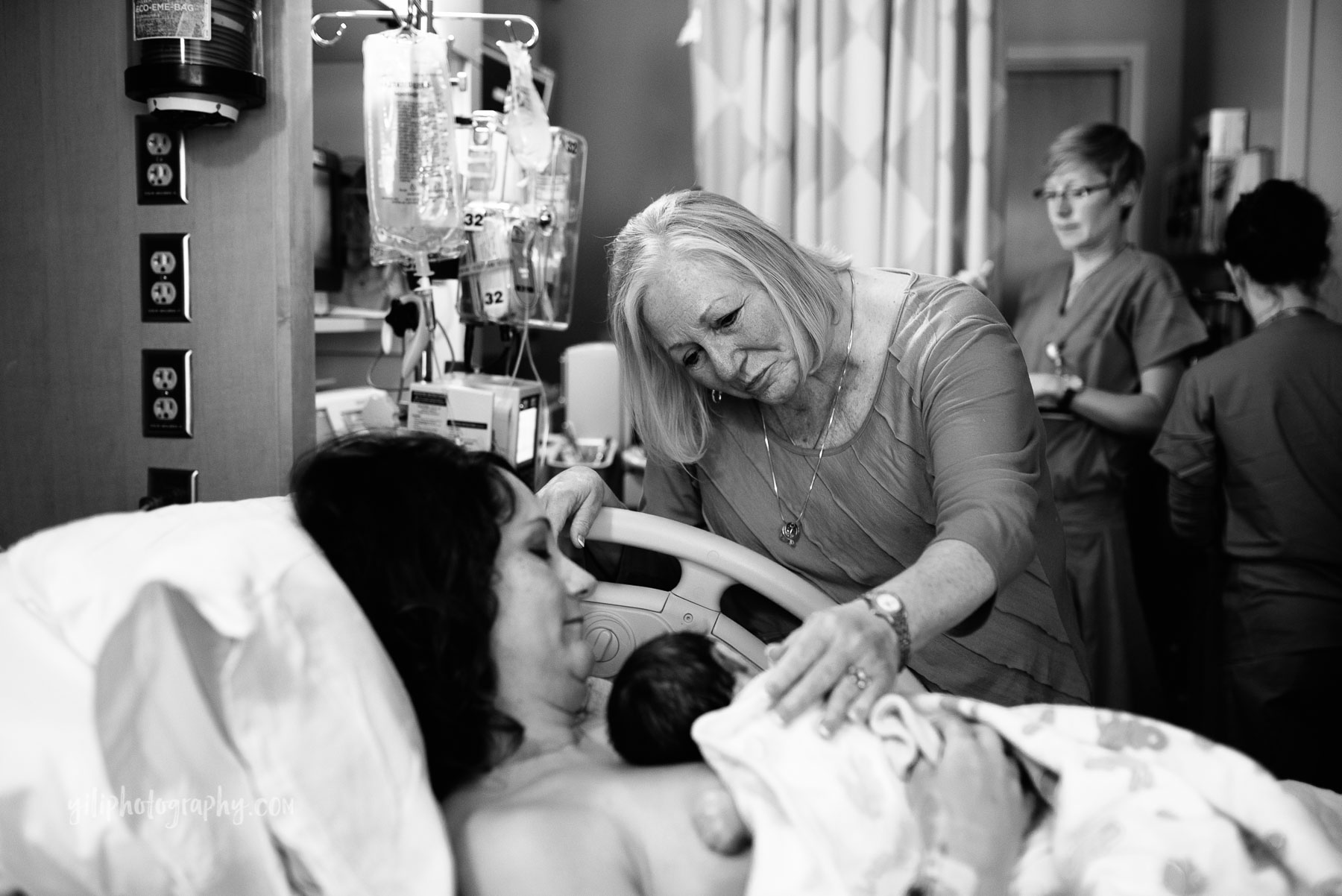 grandmother meeting baby granddaughter in hospital for first time