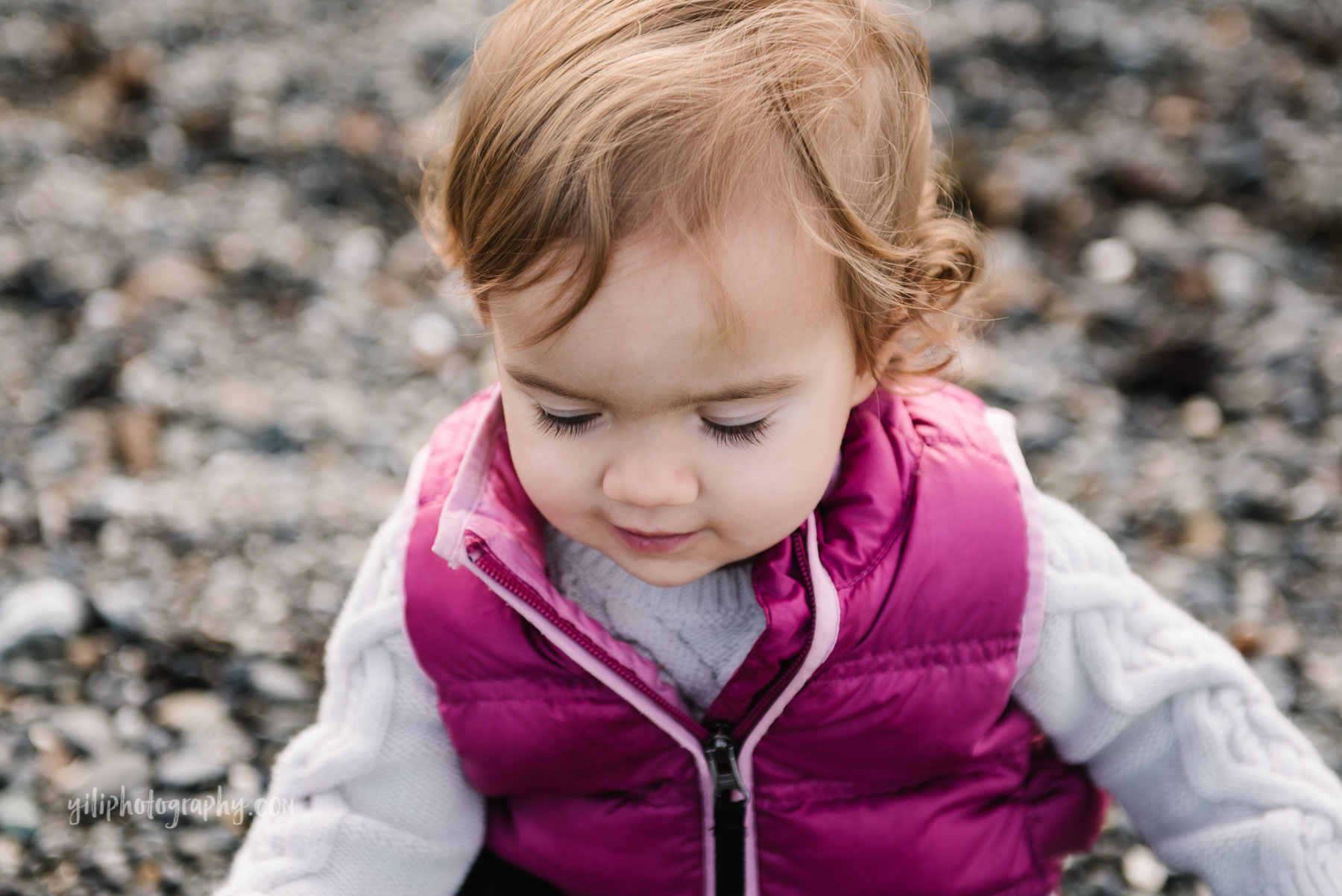 close up of toddler girl at Carkeek Beach Seattle WA