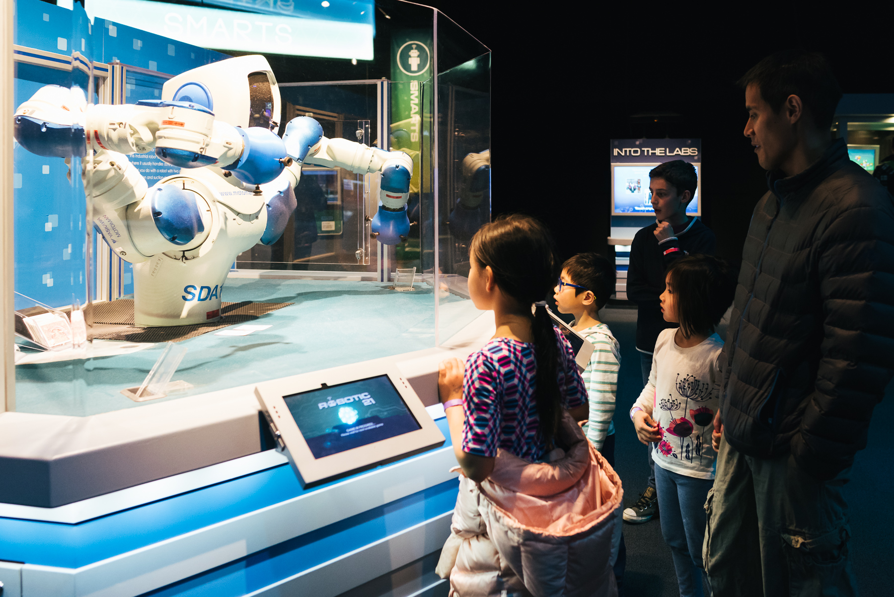 robot playing blackjack with kids