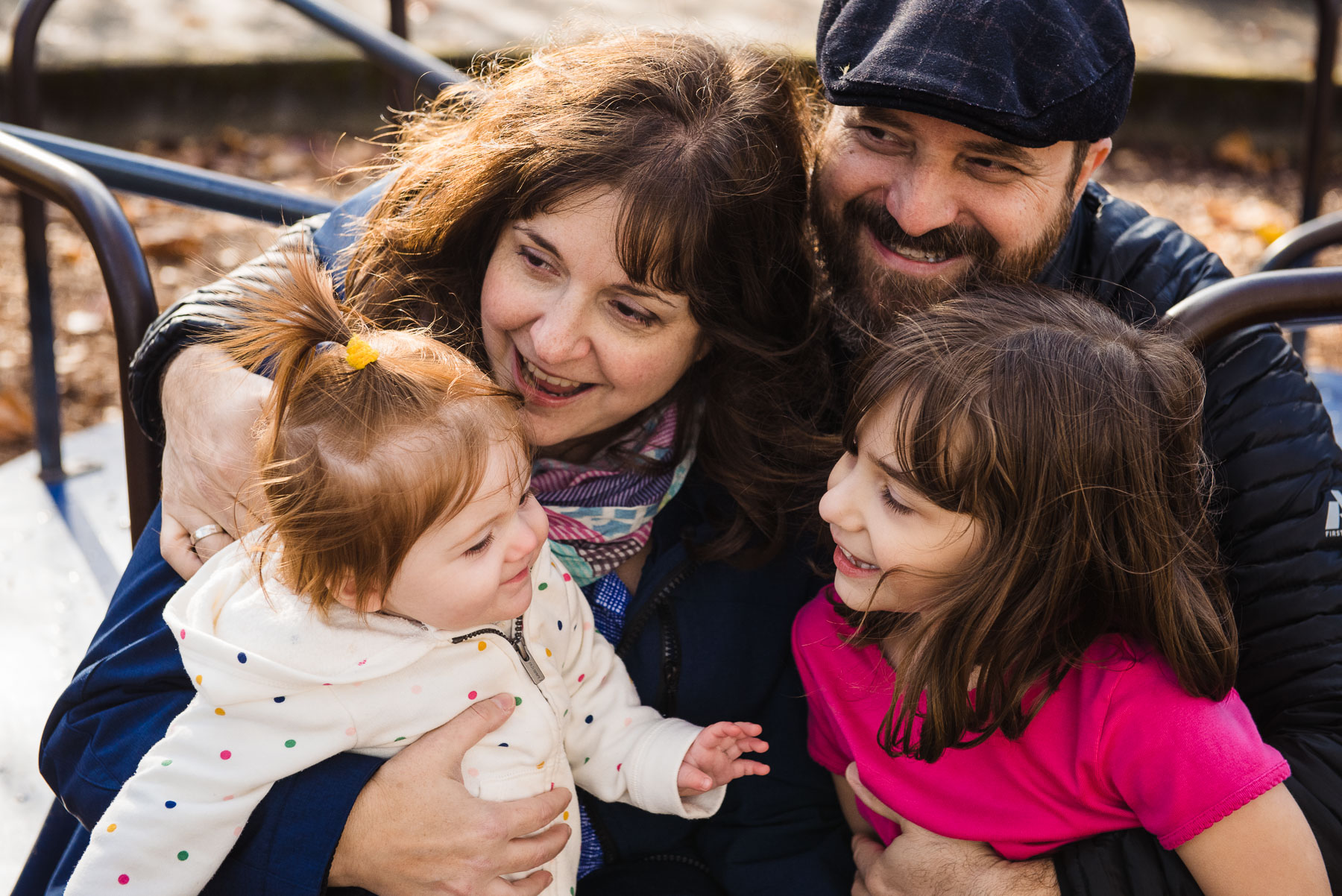 family playing together at park