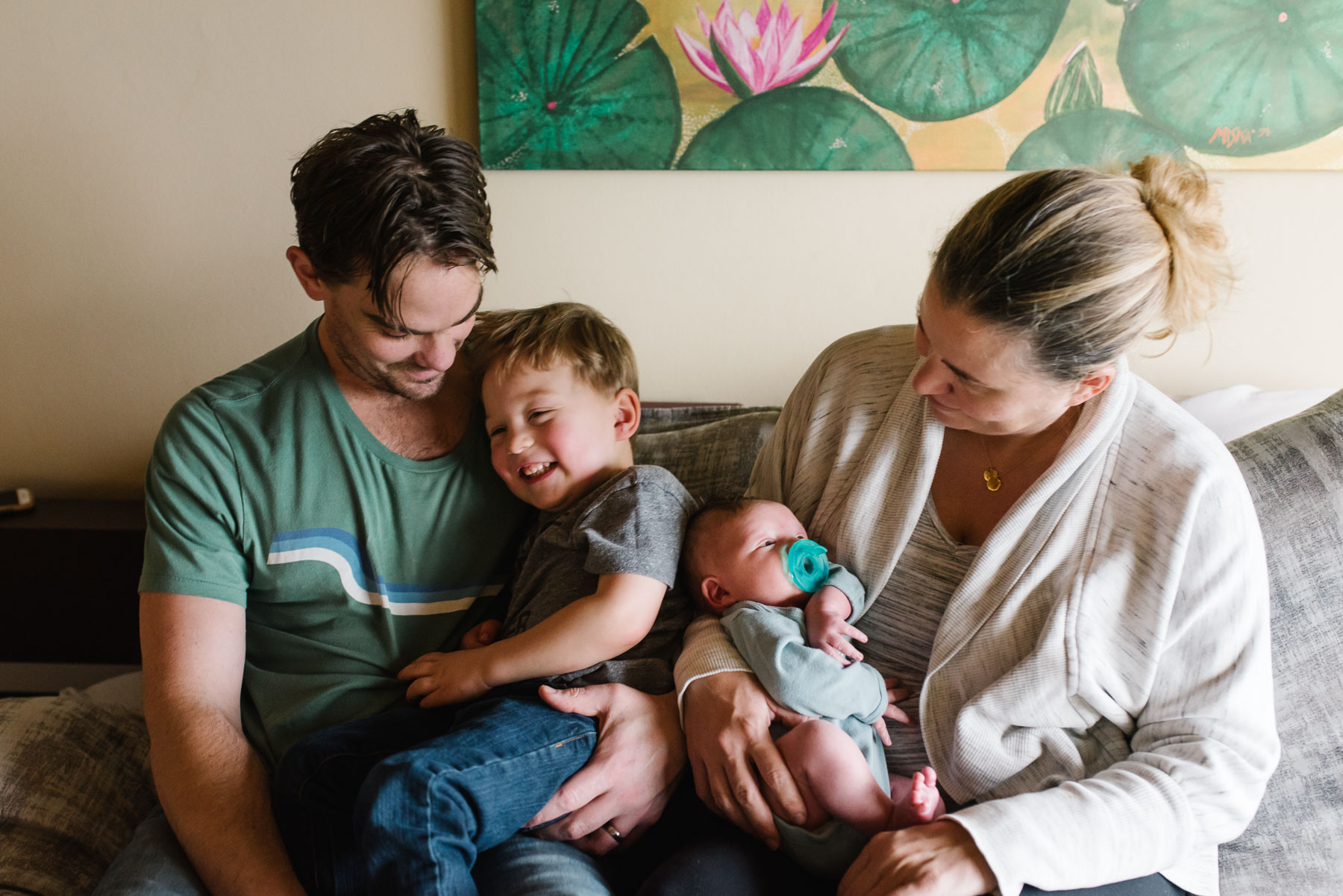 family of four with new baby