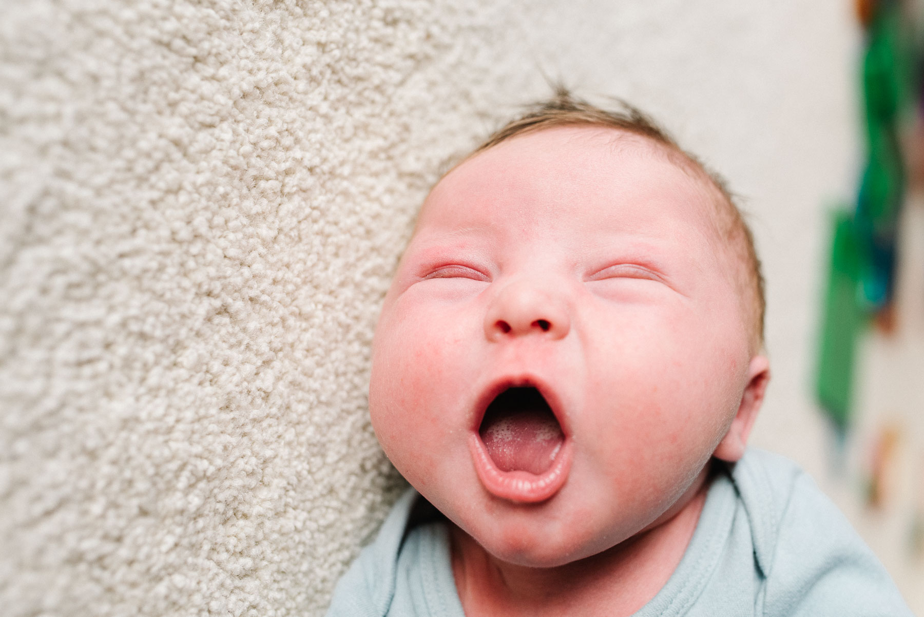 newborn baby yawning