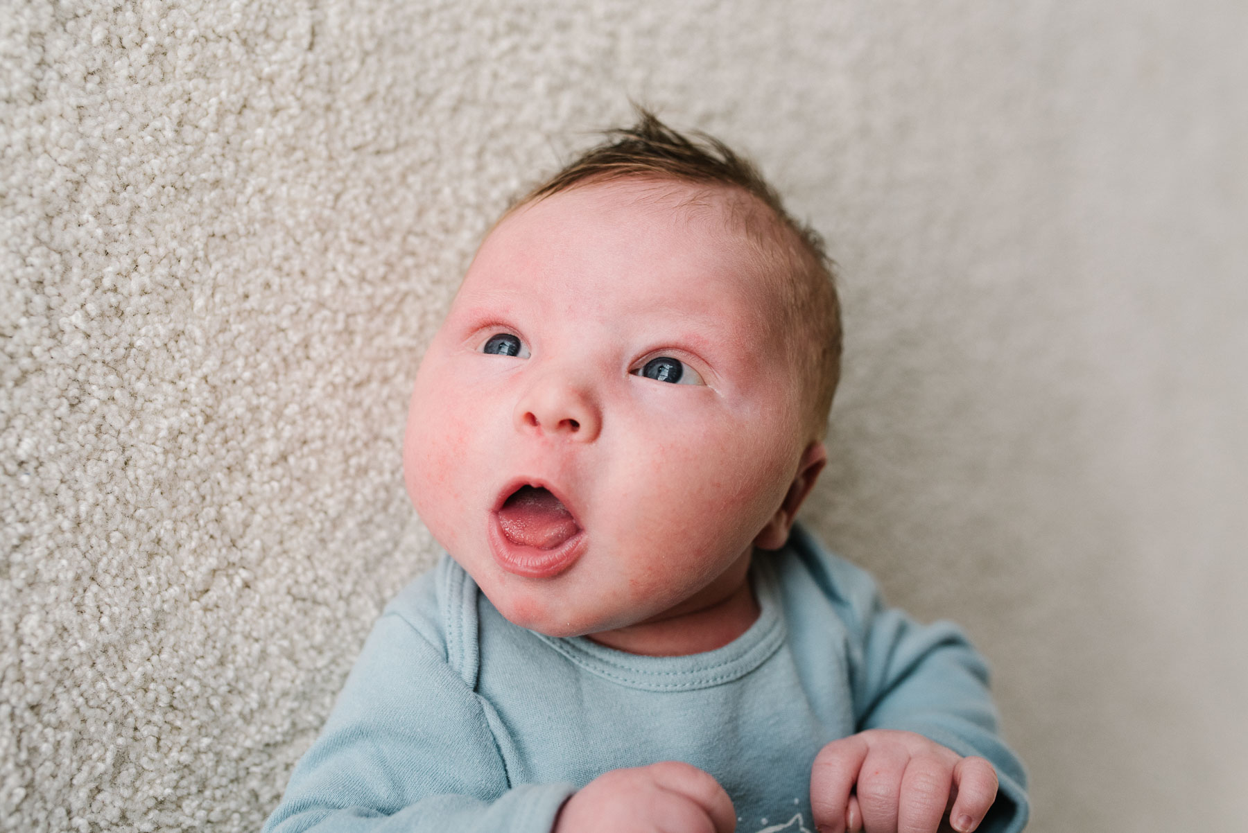 newborn baby boy awake and alert