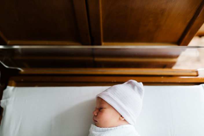 top down newborn baby in hospital bassinet