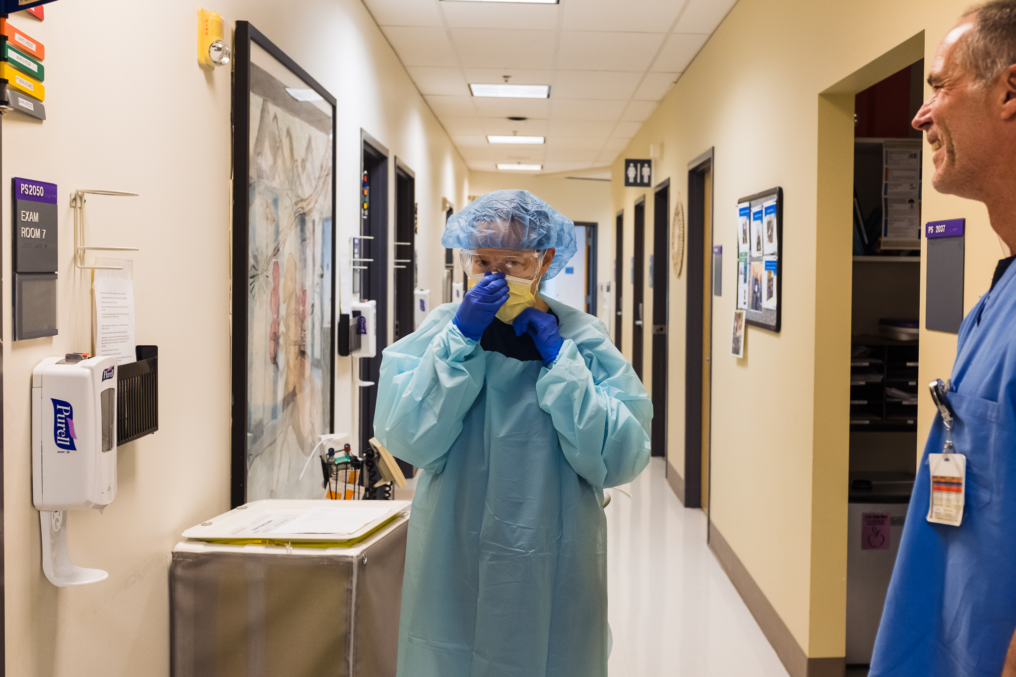 doctor wearing PPE in hallway