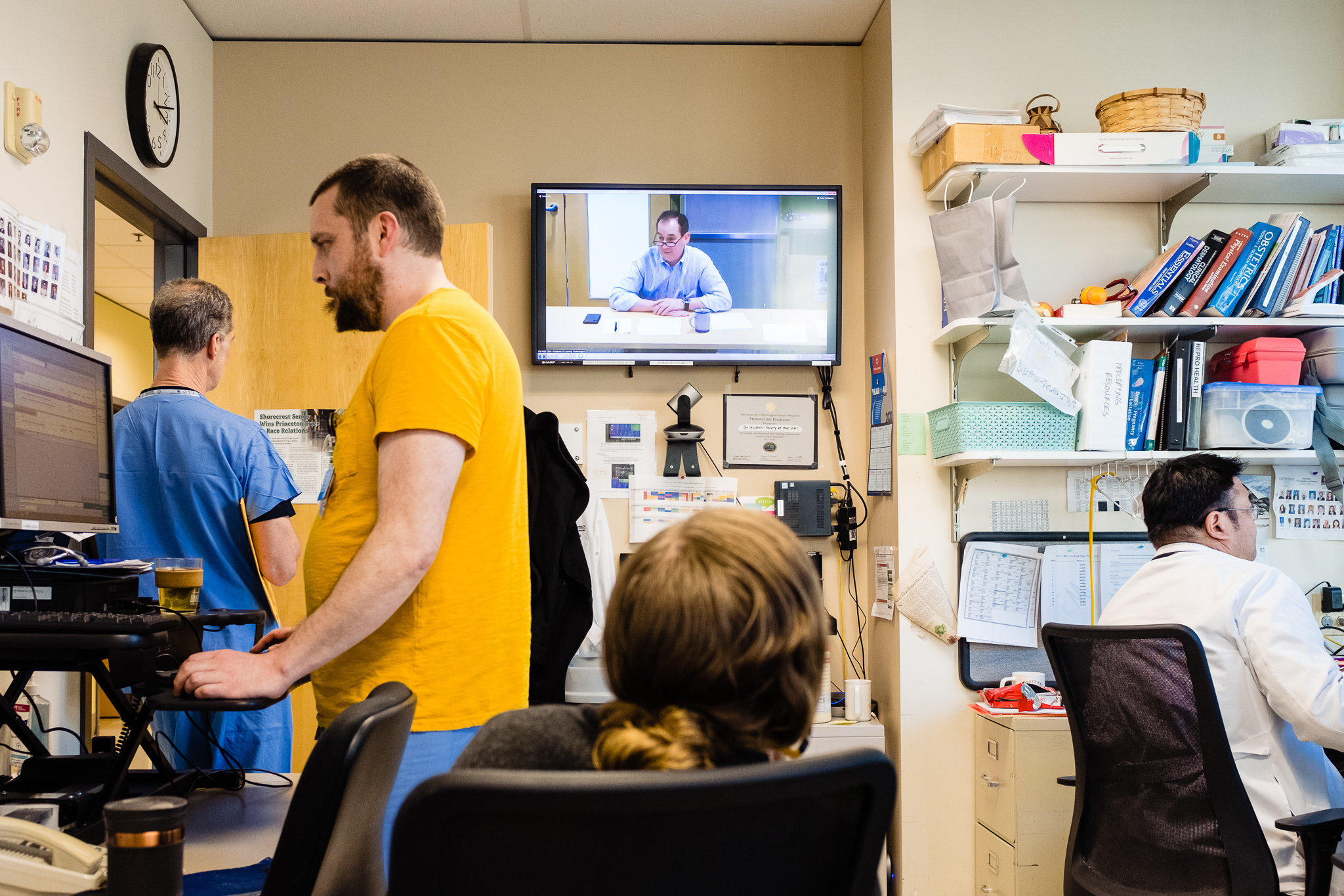 healthcare workers in clinic work room